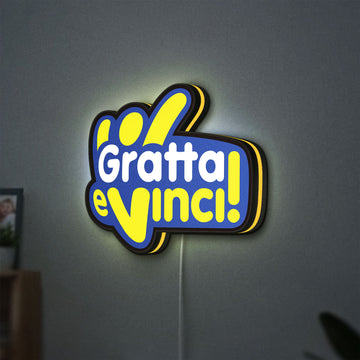 Gratta e Vinci LED lightbox hanging on a wall with yellow glow
