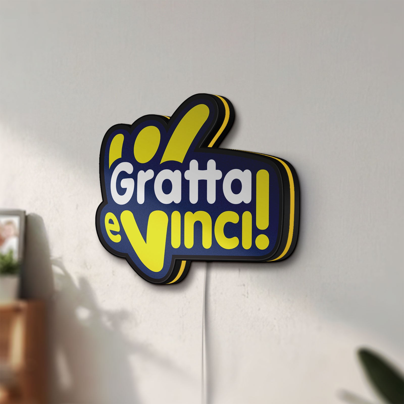 Unlit Gratta e Vinci LED lightbox mounted on a wall in daylight