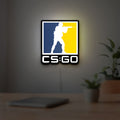 CSGO LED lightbox hanging on a room wall with soft white light