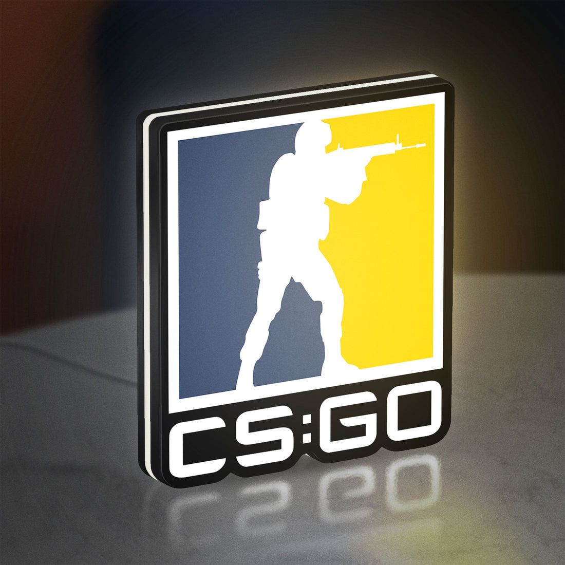 CSGO LED lightbox hanging on a wall with white glow