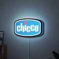 Chicco LED lightbox hanging on a wall with blue glow