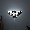 Imperial Aquila LED lightbox hanging on a wall with white glow