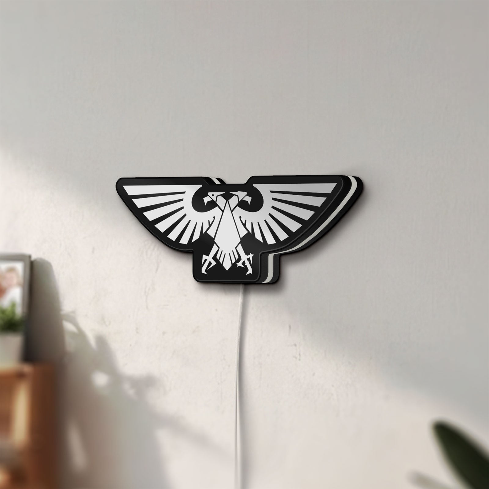 Unlit Imperial Aquila LED lightbox mounted on a wall in daylight