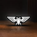 Front view of Imperial Aquila LED lightbox sign glowing on a wooden desk