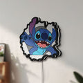 Unlit Stitch LED lightbox mounted on a wall in daylight