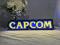 30cm Capcom 3D Printed Sign - Illuminated front view standing, unique wall art for desk and room decor
