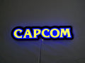 30cm Capcom Glowing Wall Art - Illuminated flat lay front view, unique wall art for desk and room decor