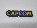 Unlit flat lay front details of Capcom 3D LED Sign in 30cm, unique wall art for desk and room decor