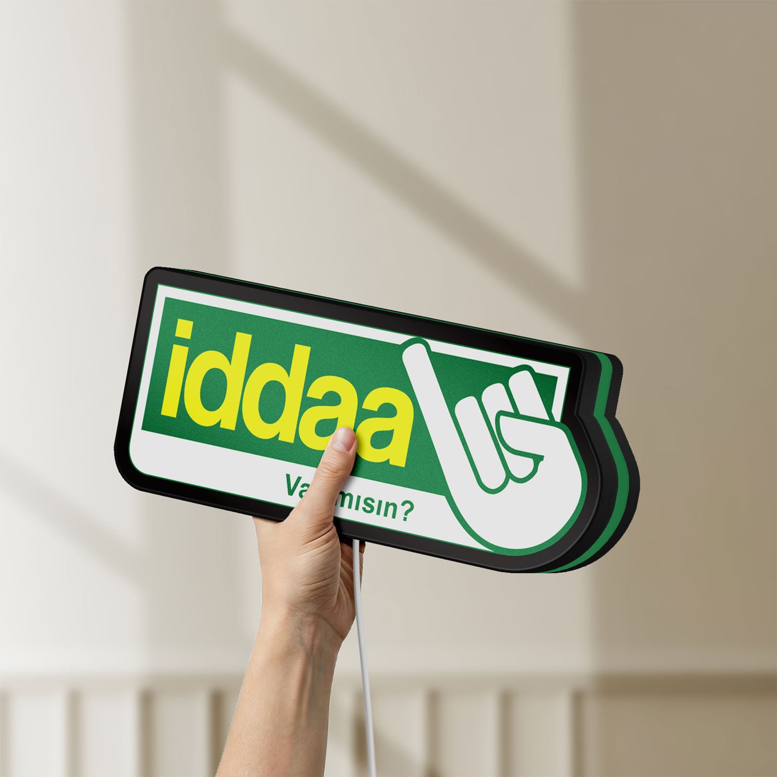Unlit Iddaa LED lightbox held by hand to show size and details