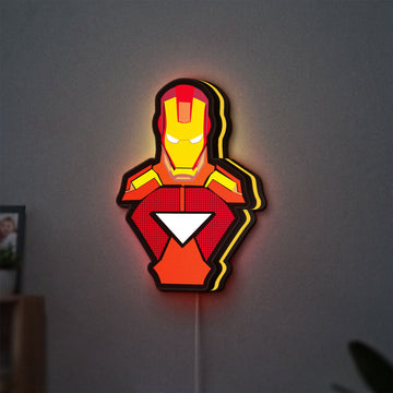 Iron Man LED lightbox hanging on a wall with yellow glow