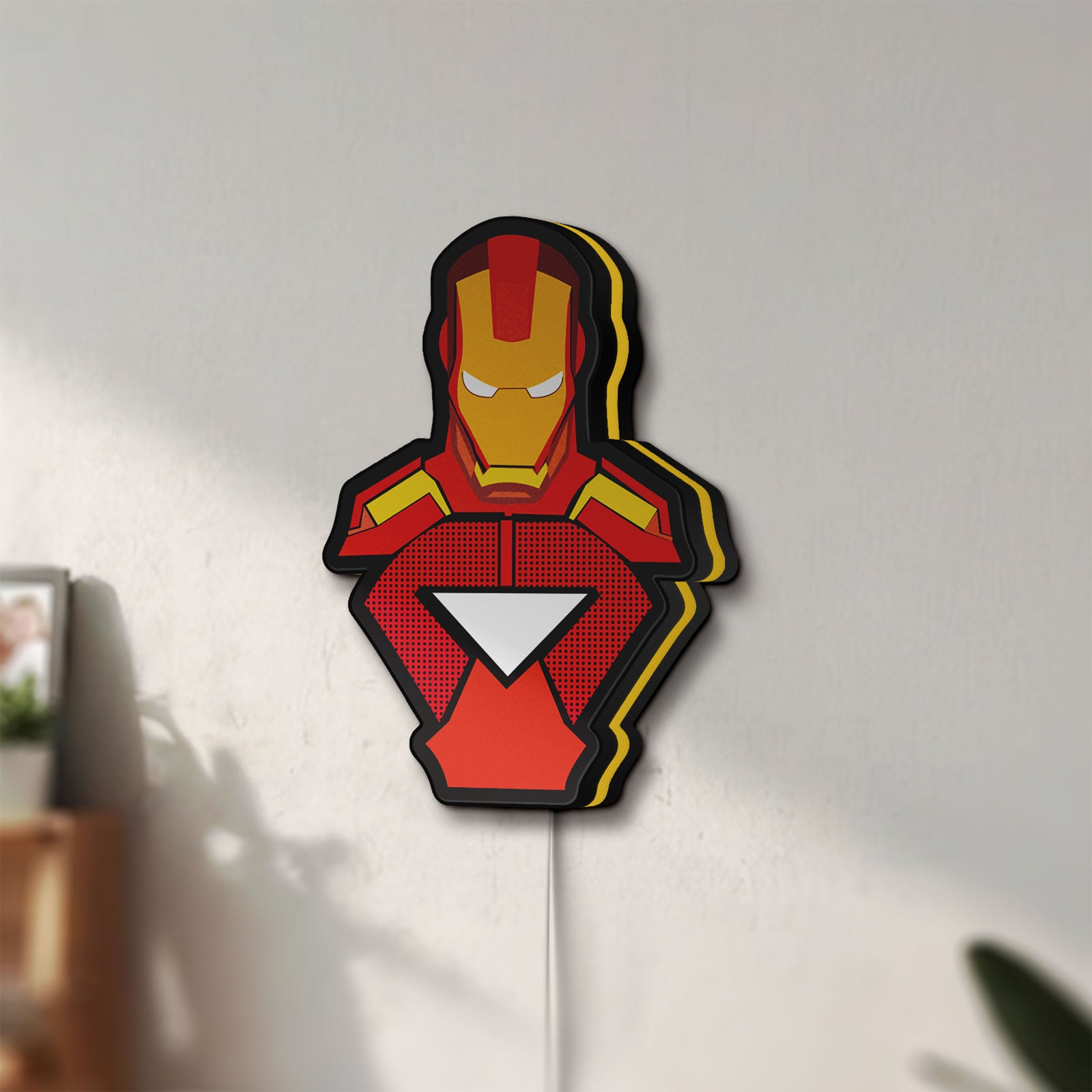 Unlit Iron Man LED lightbox mounted on a wall in daylight