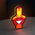 Iron Man LED lightbox standing on a desk from an angled side view with yellow glow