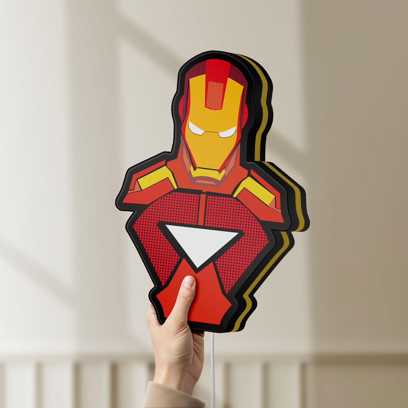 Unlit Iron Man LED lightbox held by hand to show size and details