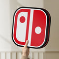 Unlit Nintendo Switch LED lightbox held by hand to show size and details