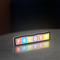 Pocoyo LED lightbox standing on a desk from an angled side view with white glow