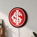 Unlit Sport Club Internacional 6 Estrelas LED lightbox mounted on a wall in daylight