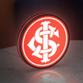 Sport Club Internacional 6 Estrelas LED lightbox standing on a desk from an angled side view with red glow