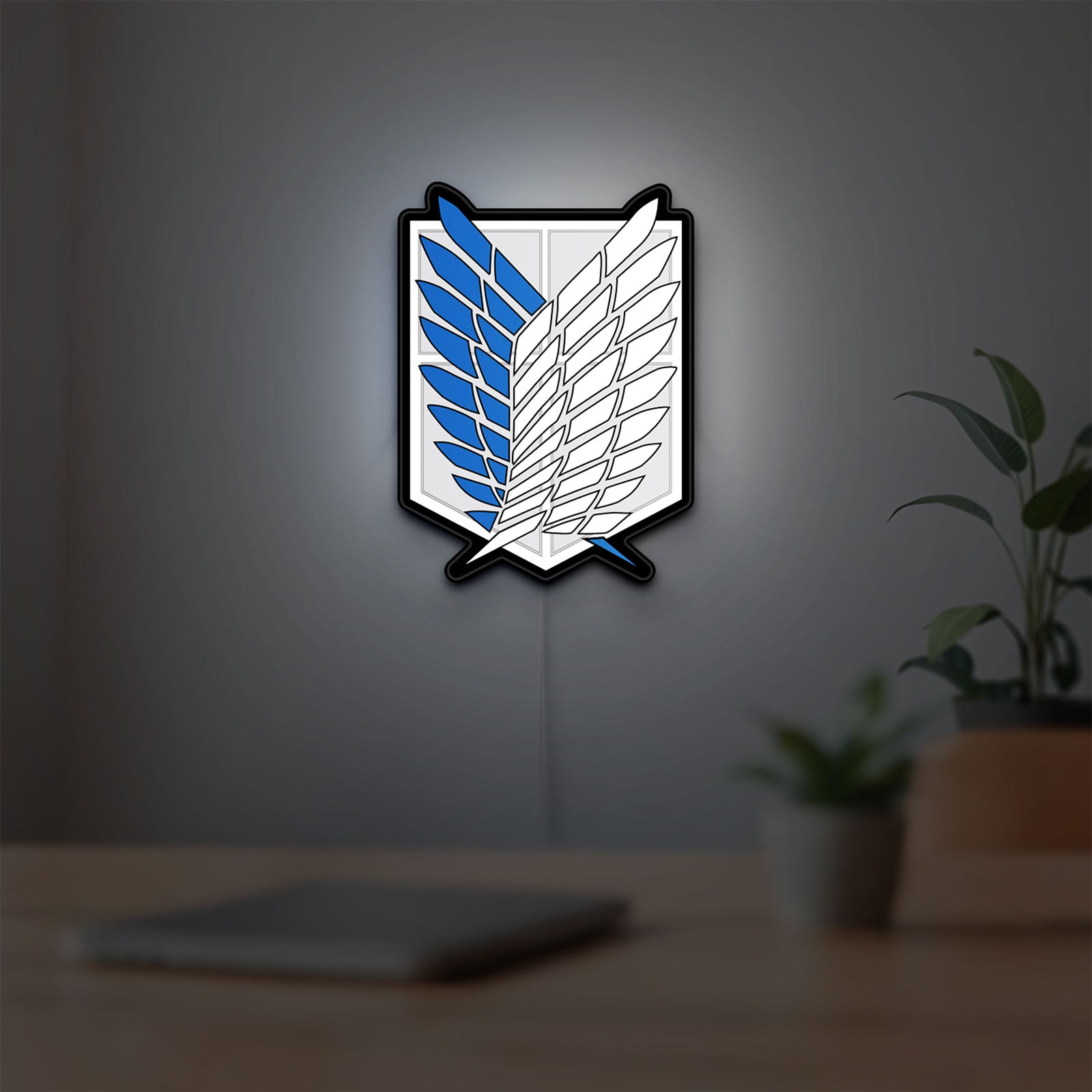 Wings of Freedom 2021 LED lightbox hanging on a room wall with soft white light