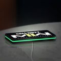 Call of Duty Modern Warfare II LED lightbox lying flat on a desk with green glow