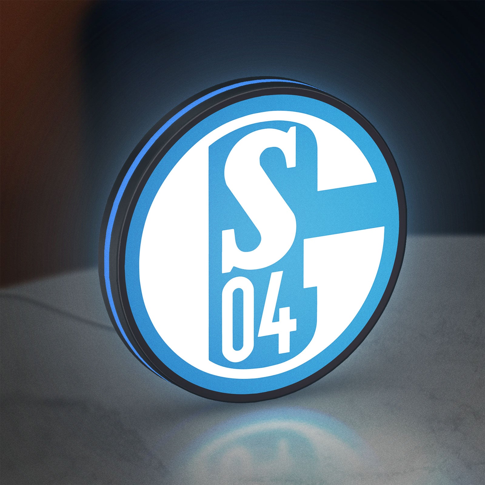 FC Gelsenkirchen Schalke 04 LED lightbox standing on a desk from an angled side view with blue glow