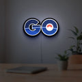 Pokemon Go LED lightbox hanging on a room wall with soft blue light