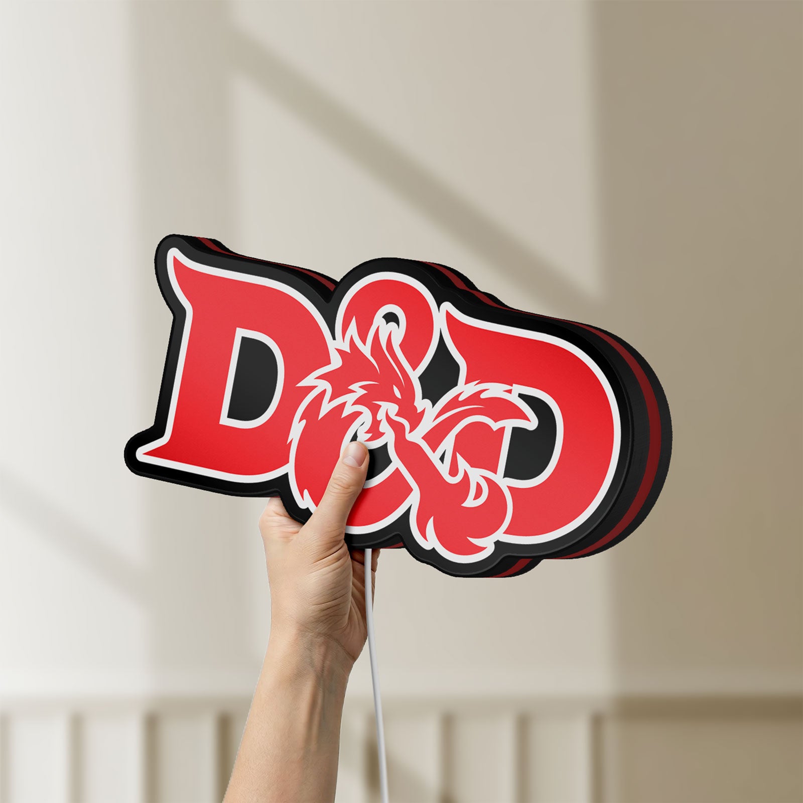 Unlit Dungeons Dragons 5e LED lightbox held by hand to show size and details
