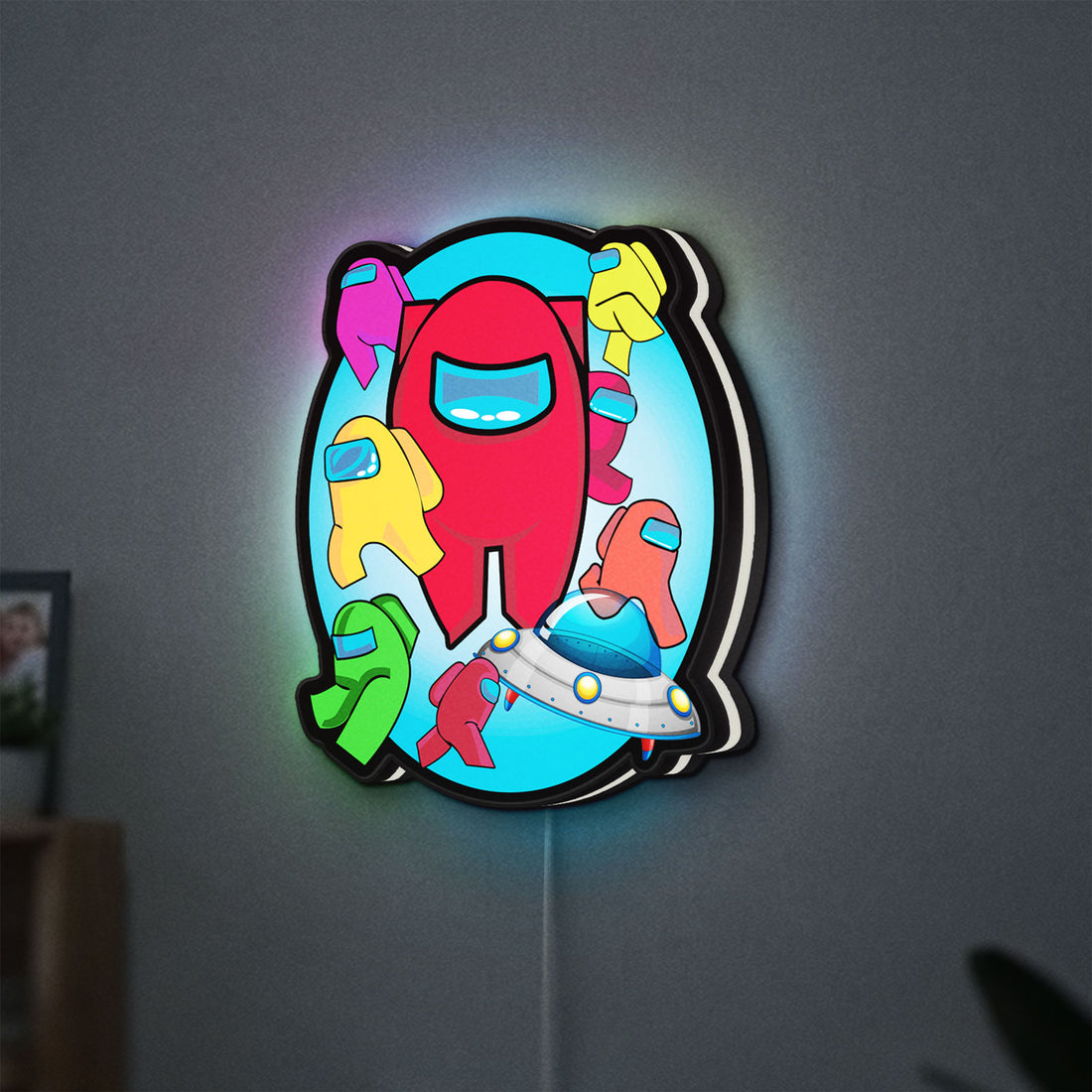 Among Us LED lightbox hanging on a wall with white glow