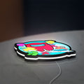 Among Us LED lightbox lying flat on a desk with white glow