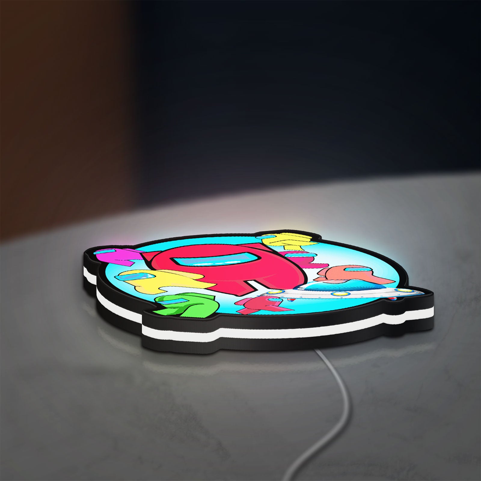 Among Us LED lightbox lying flat on a desk with white glow