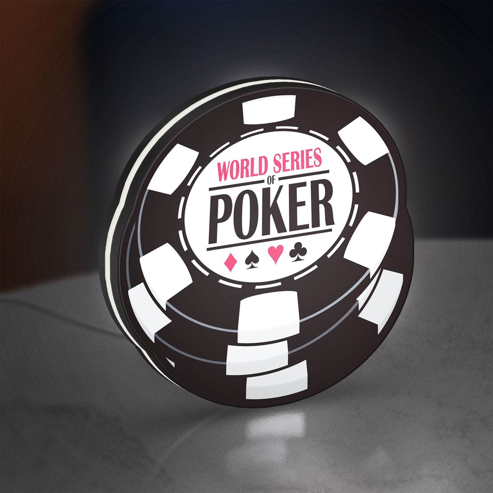 World Series of Poker LED lightbox standing on a desk from an angled side view with white glow