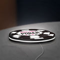 World Series of Poker LED lightbox lying flat on a desk with white glow