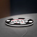 World Championship Poker LED lightbox lying flat on a desk with white glow