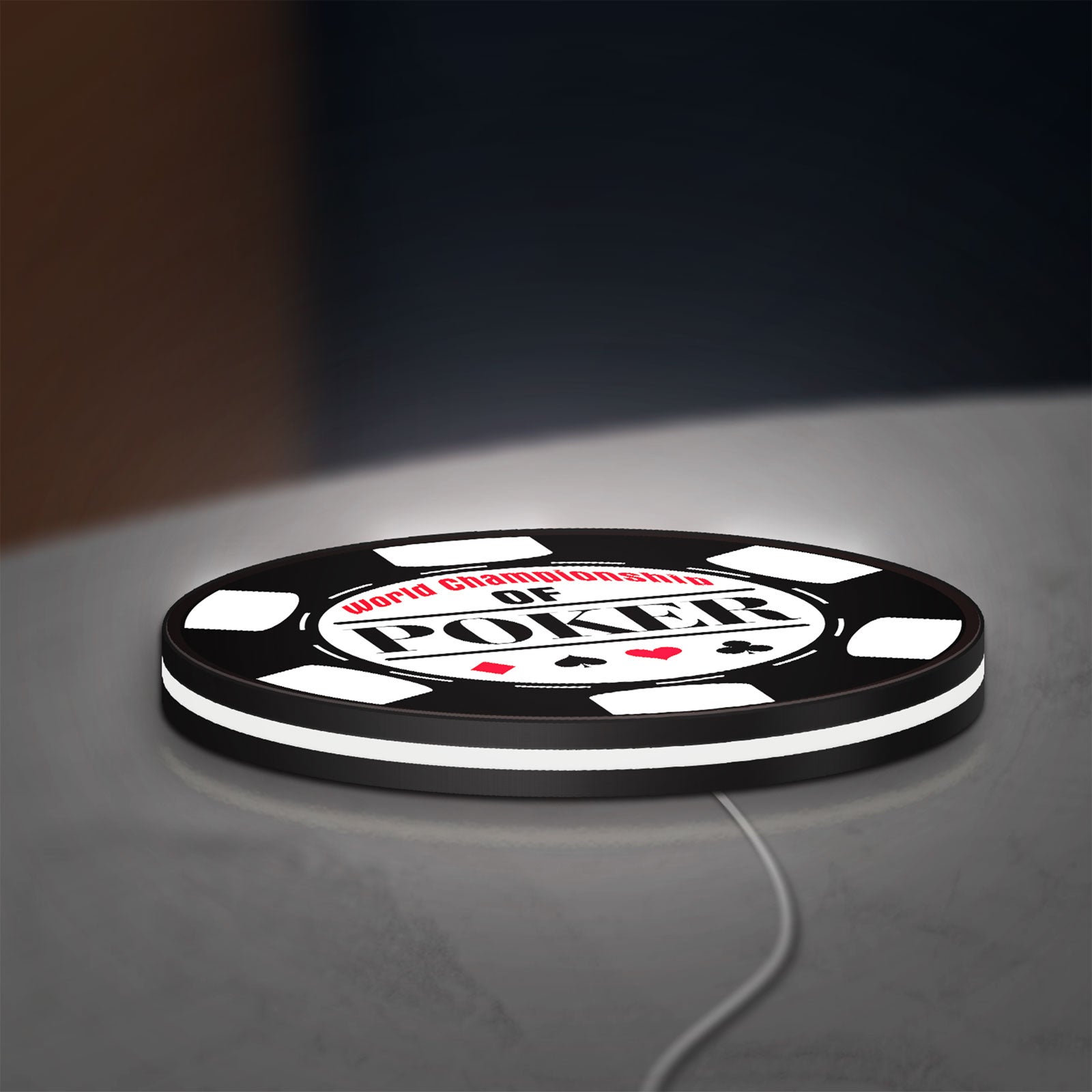 World Championship Poker LED lightbox lying flat on a desk with white glow