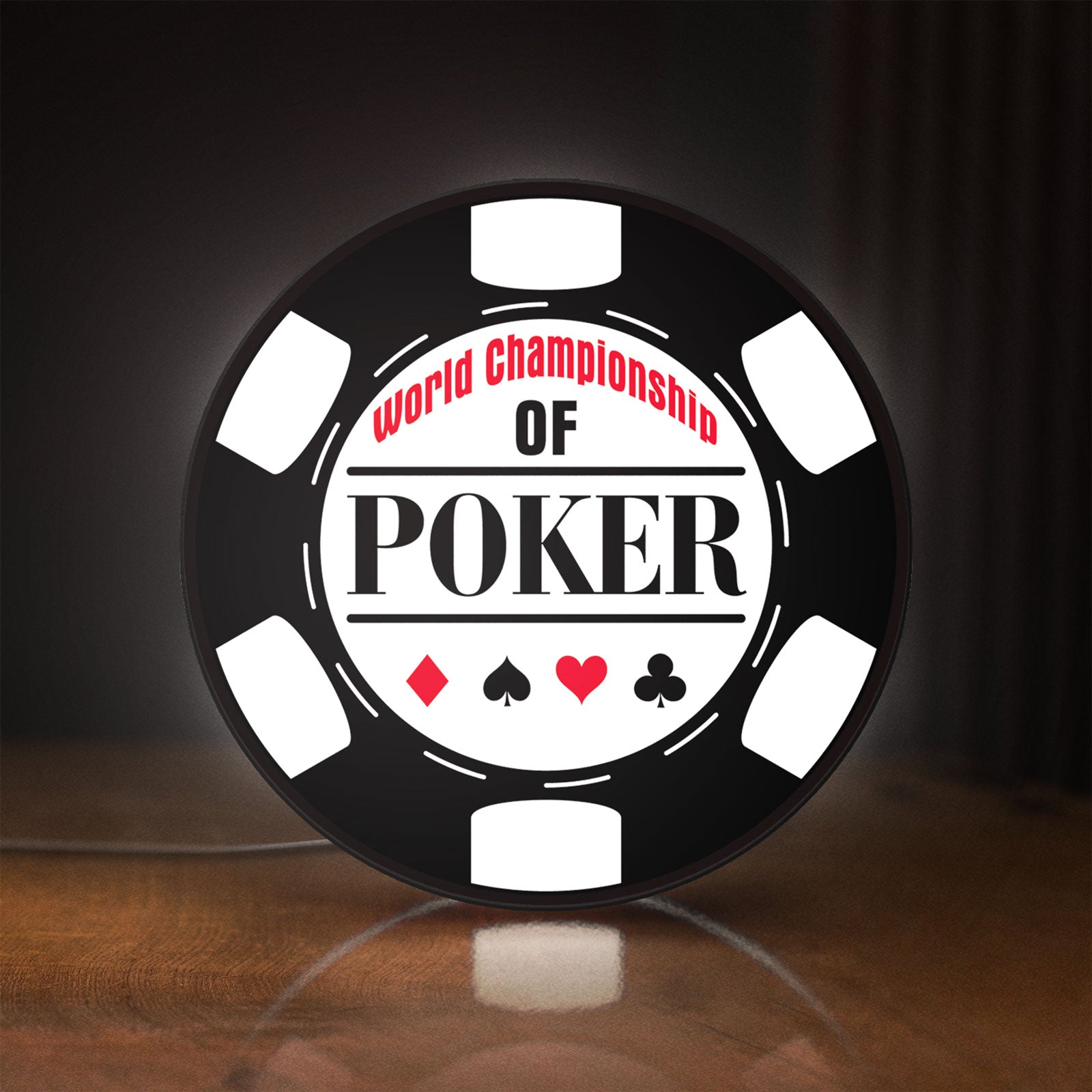 Front view of World Championship Poker LED lightbox sign glowing on a wooden desk