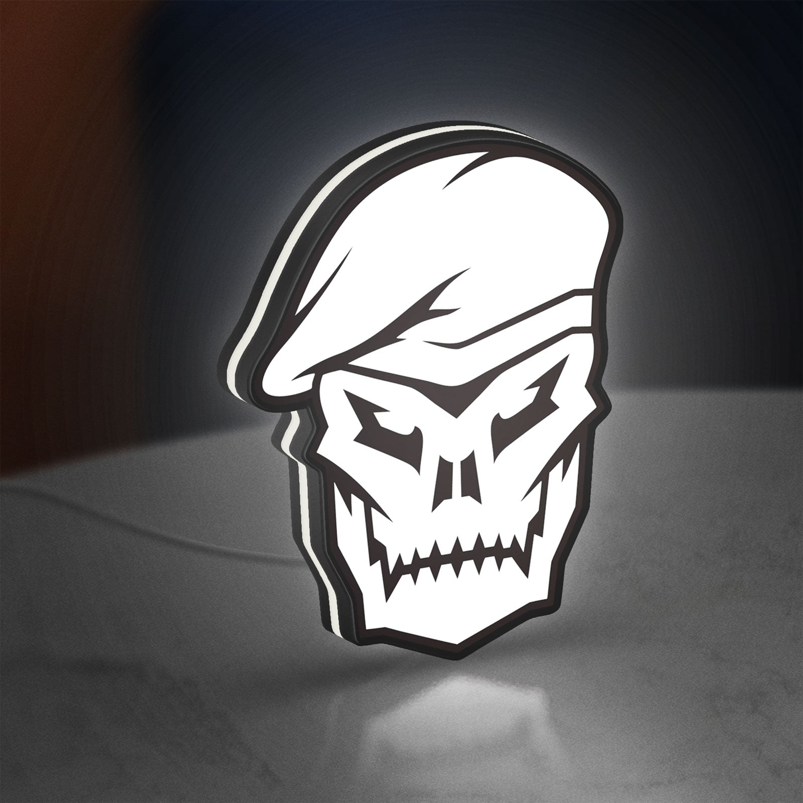Call of Duty Black Ops Skull LED lightbox standing on a desk from an angled side view with white glow