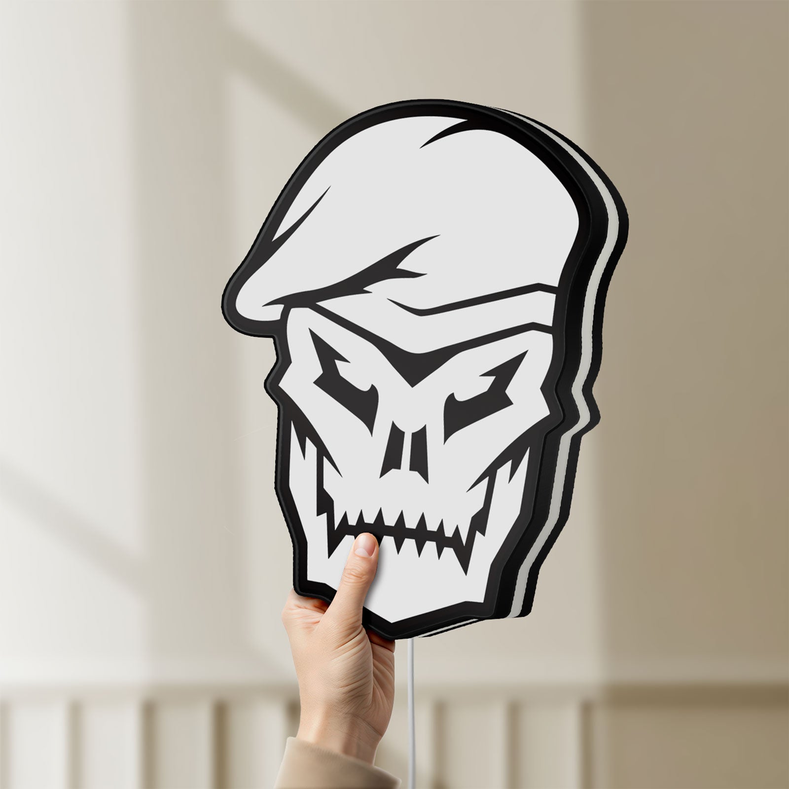 Unlit Call of Duty Black Ops Skull LED lightbox held by hand to show size and details
