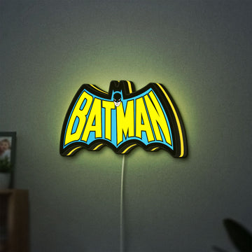Batman LED lightbox hanging on a wall with yellow glow