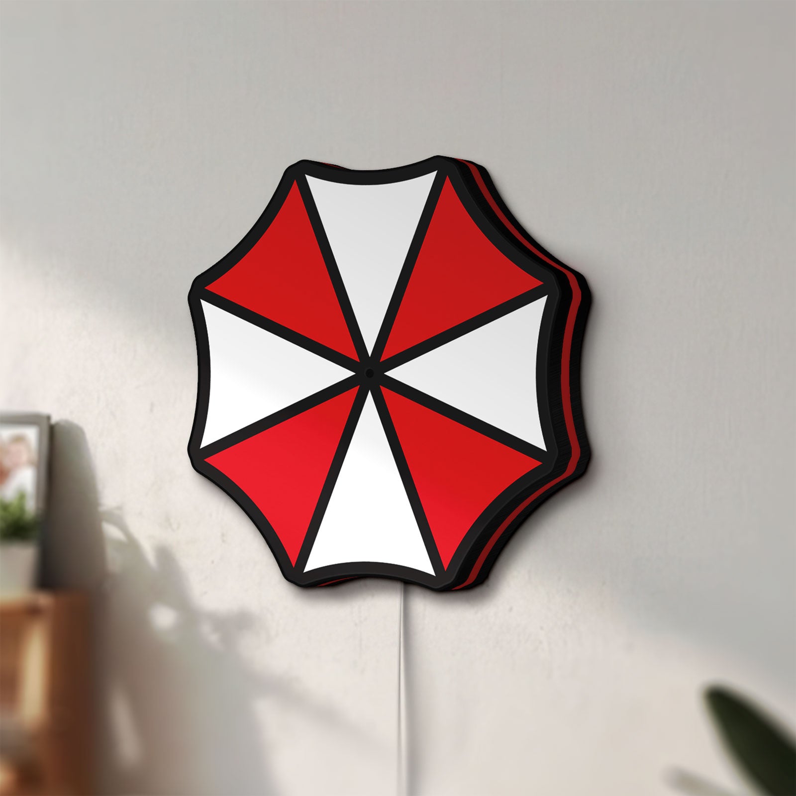 Unlit Umbrella Corps LED lightbox mounted on a wall in daylight