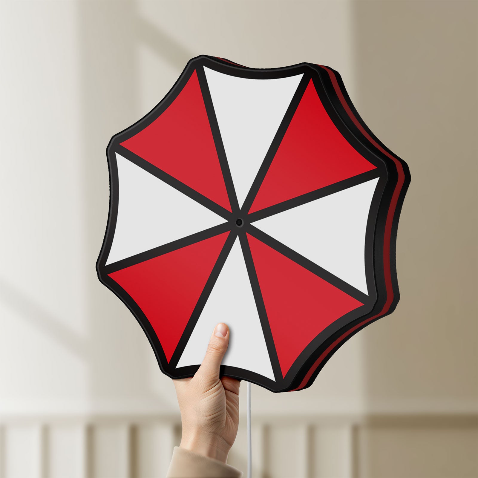 Unlit Umbrella Corps LED lightbox held by hand to show size and details