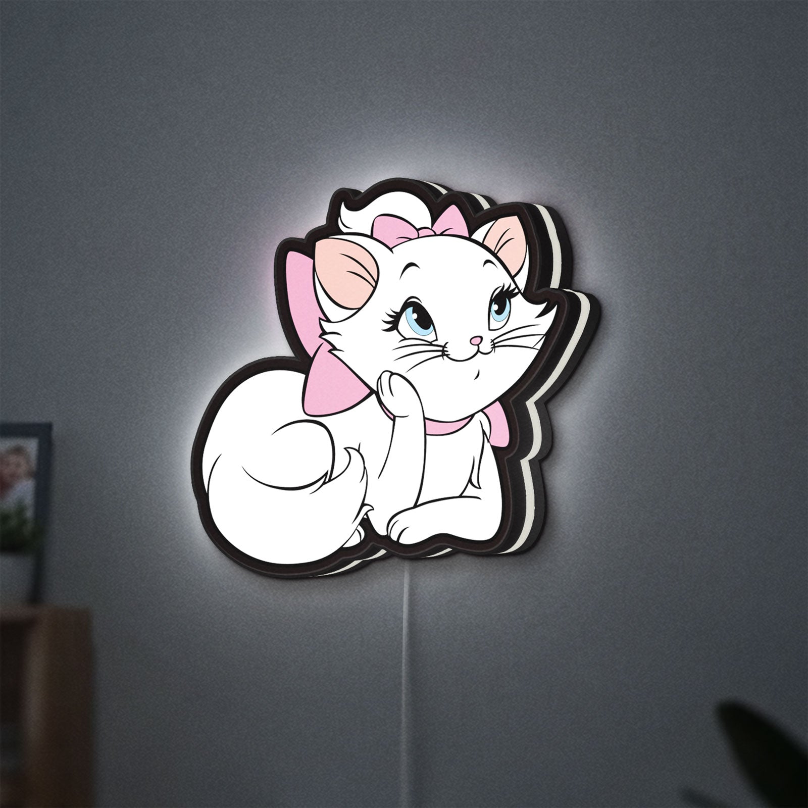 Marie Aristocats LED lightbox hanging on a wall with white glow