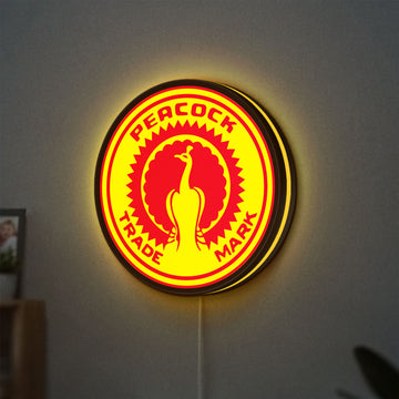 Standard Auto Parts LED lightbox hanging on a wall with yellow glow