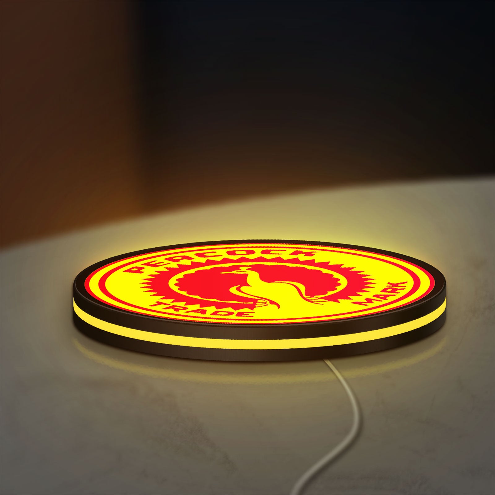 Standard Auto Parts LED lightbox lying flat on a desk with yellow glow