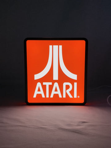 Illuminated front view standing of Atari Illuminated Sign in 20cm, unique wall art for desk and room decor