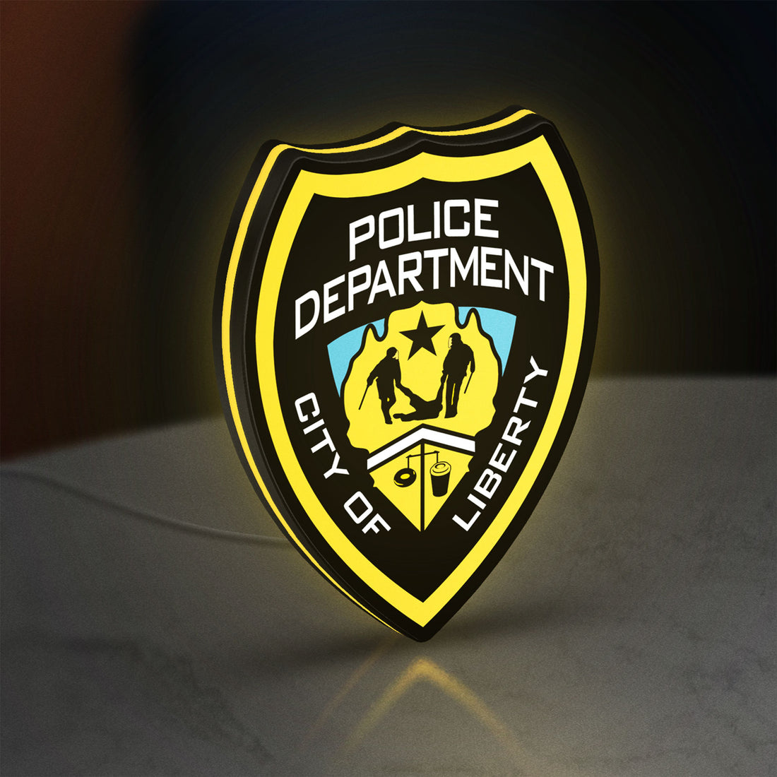 Liberty City Police LED lightbox hanging on a wall with yellow glow