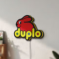 Unlit Duplo Lego LED lightbox mounted on a wall in daylight