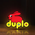 Front view of Duplo Lego LED lightbox sign glowing on a wooden desk