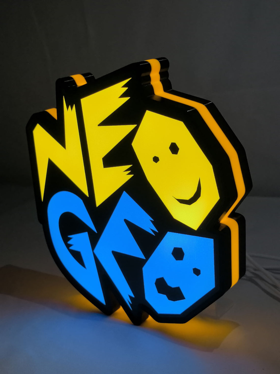 Neo Geo Arcade LED Sign (20cm) - Illuminated front view standing, unique wall art for desk and room decor