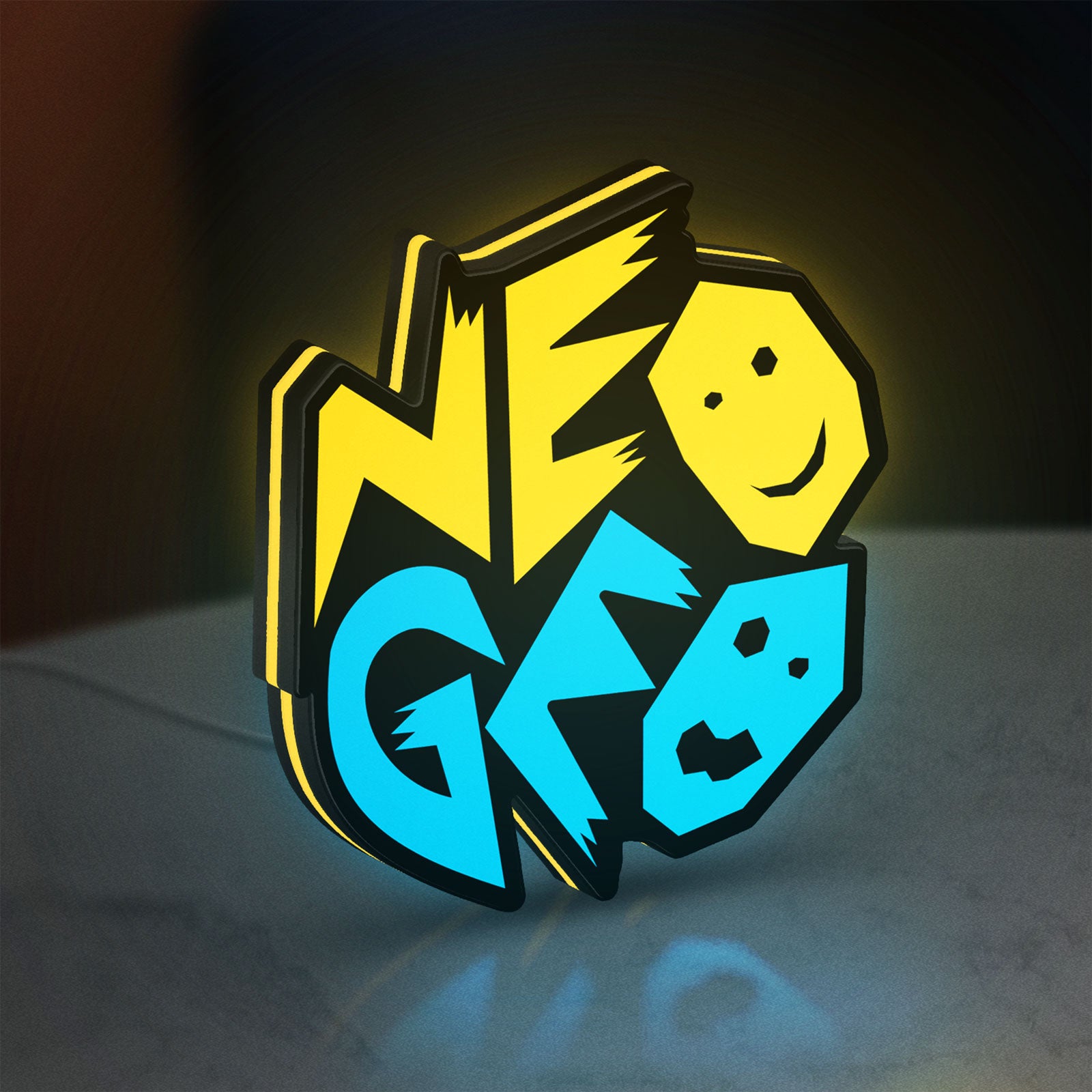 Neo Geo Arcade LED lightbox standing on a desk from an angled side view with yellow glow