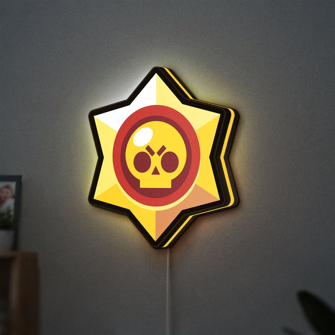 Brawl Stars LED lightbox hanging on a wall with yellow glow