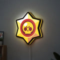 Brawl Stars LED lightbox hanging on a wall with yellow glow